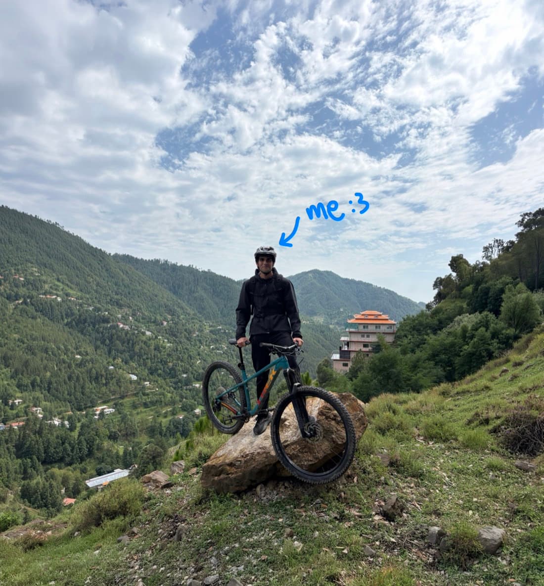 Shahum M. riding a mountain bike